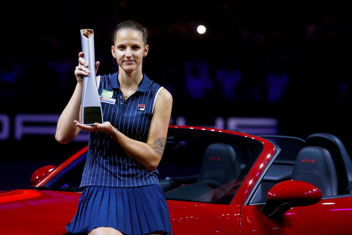 Czech Republic's Karolina Pliskova celebrates with the trophy after winning the final against CoCo Vandeweghe of the US on Sunday. Reuters