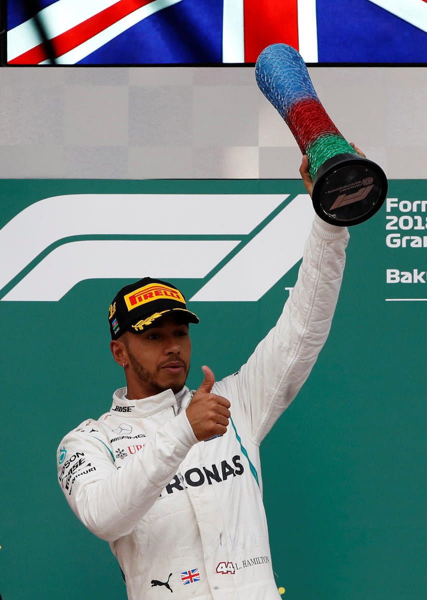 Mercedes' Lewis Hamilton celebrates after winning the Azerbaijan Grand Prix on Sunday. REUTERS
