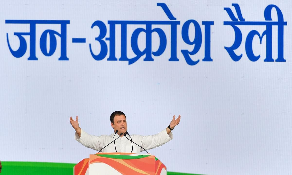 Congress President Rahul Gandhi addresses during 'Jan Akrosh Rally', in New Delhi on Sunday. PTI Photo