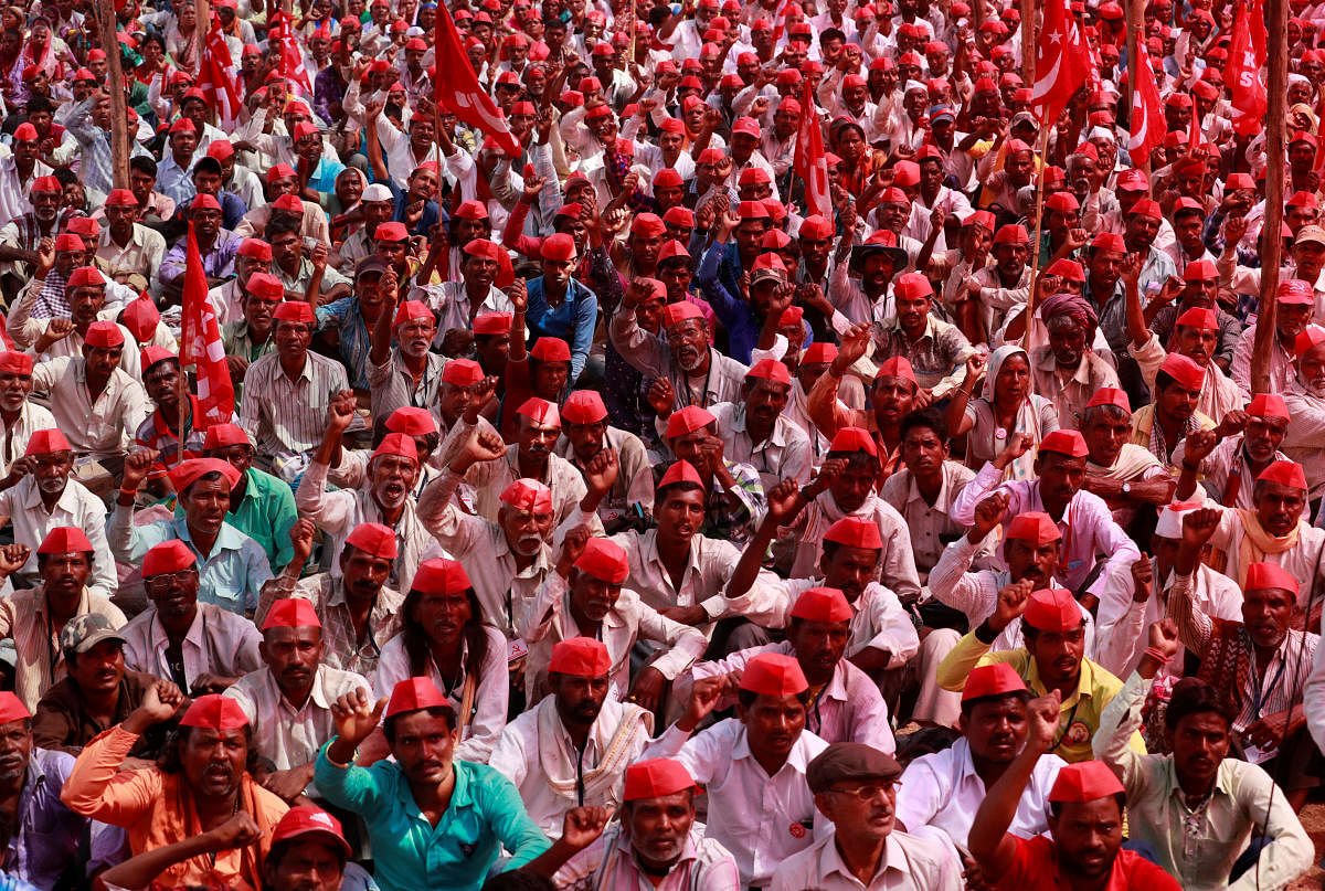 Farmers shout slogans against the government at a rally organised by All India Kisan Sabha in Mumbai. Reuters File Photo