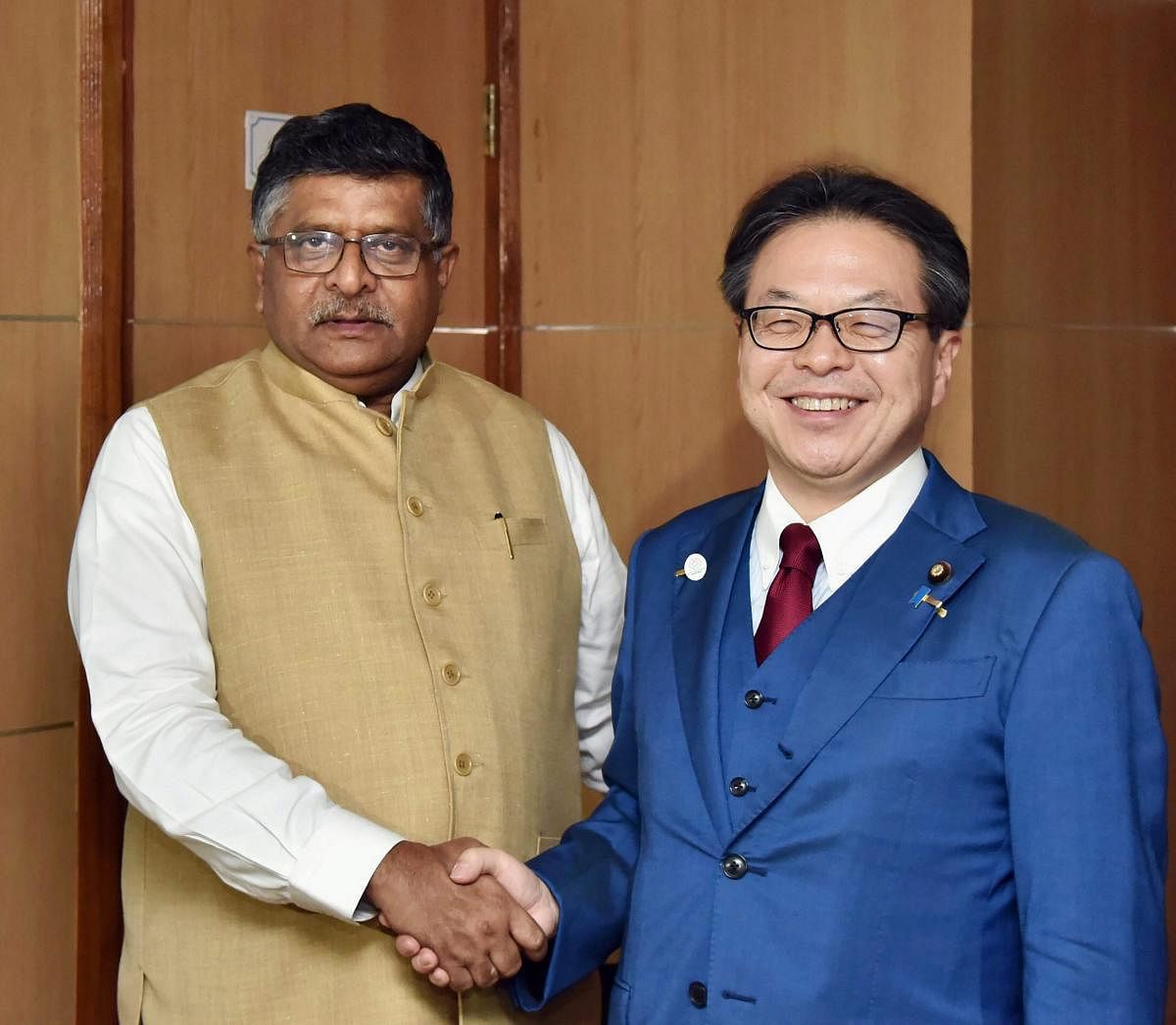 Minister of Economy Trade and Industry, Japan, Hiroshige Seko meets with the Union Minister for Electronics &amp; Information Technology and Law &amp; Justice, Ravi Shankar Prasad in New Delhi on Tuesday. PTI Photo