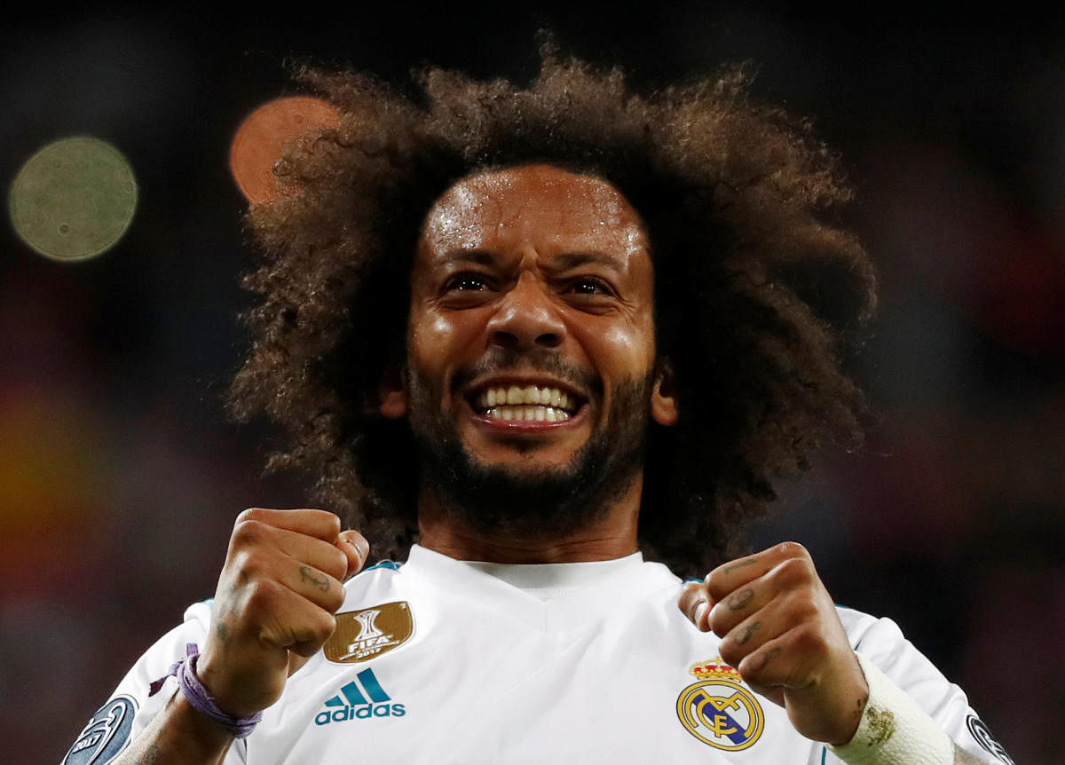 Lucky escape: Real Madrid's Marcelo admitted that the ball hit his hand during their Champions League semifinal second leg game against Bayern Munich on Tuesday. REUTERS