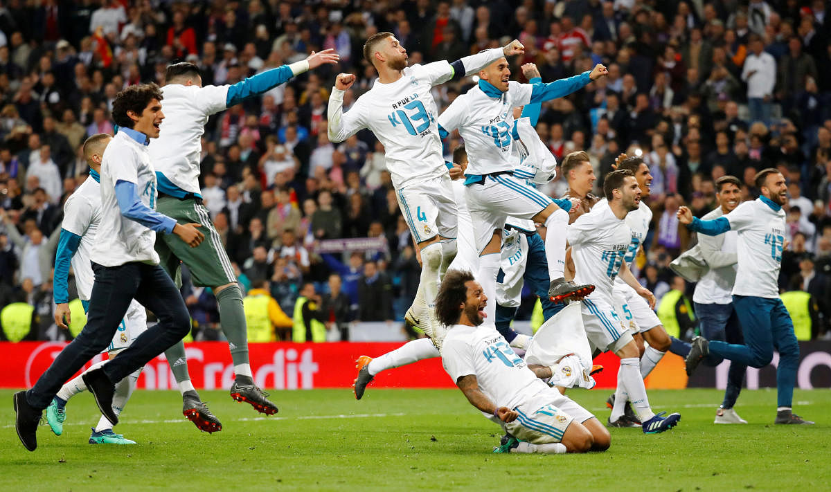 Real Madrid players celebrate after the second leg of their Champions League semi-final against Bayern Munich. (Reuters photo)