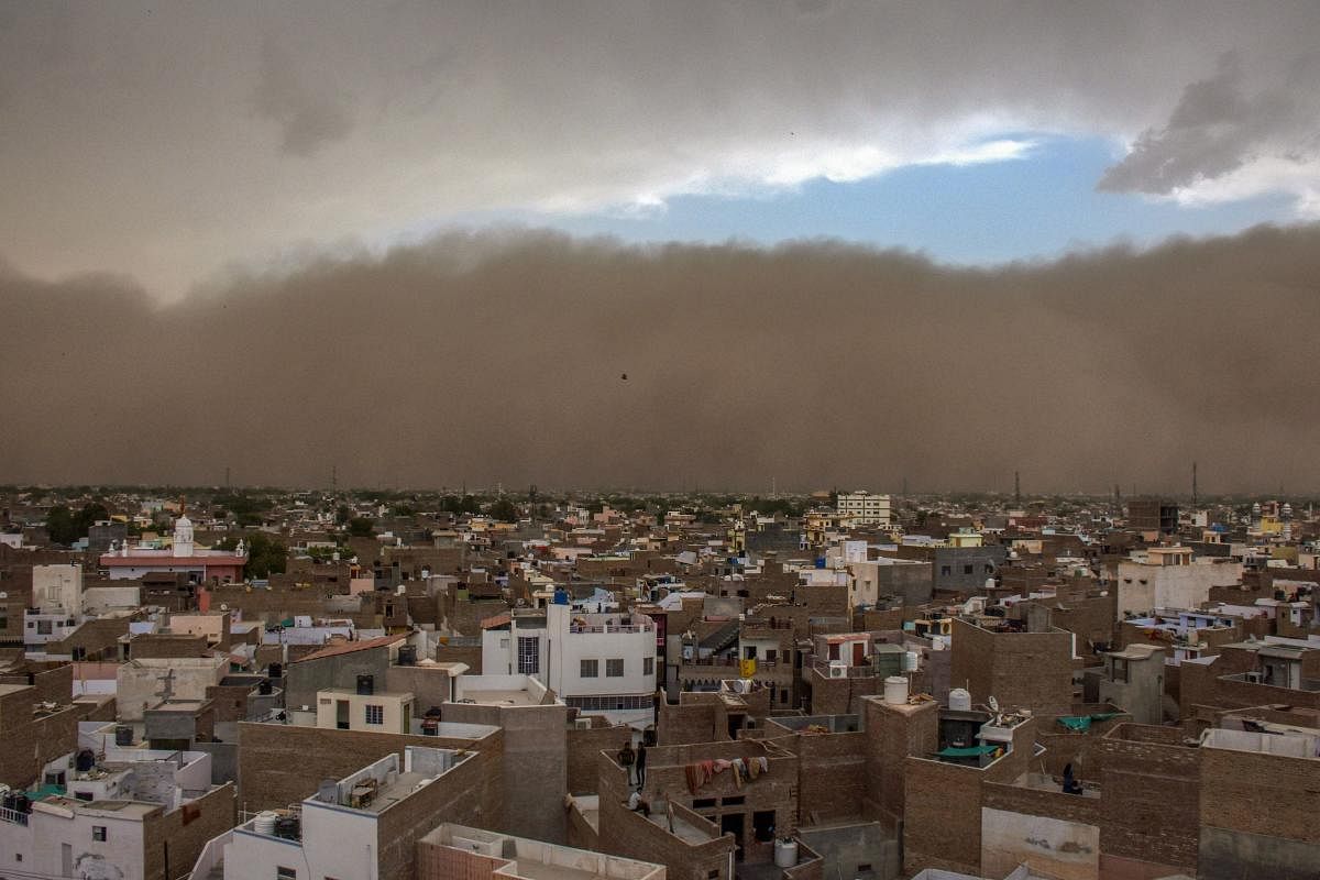 A dust storm approaches the city of Bikaner. PTI photo.