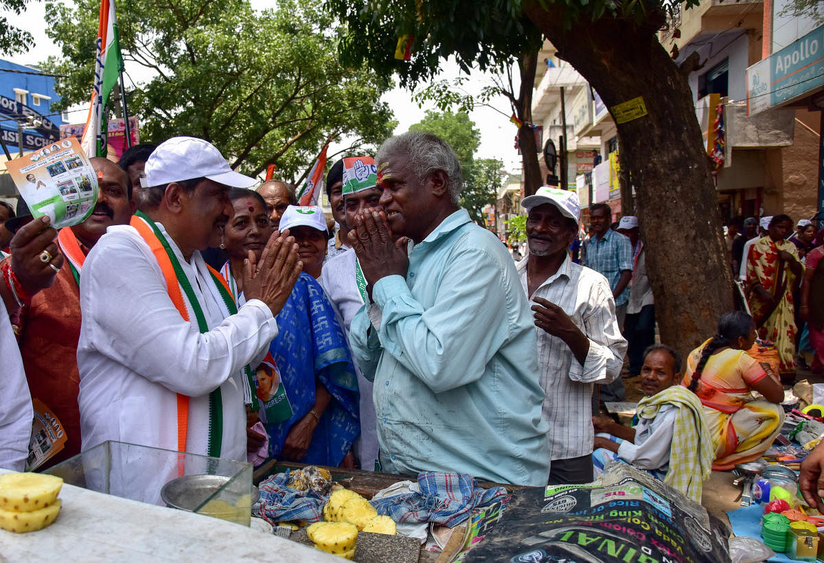 Sarvagnanagar Constituency Congress Candidate K J George seen during the Campaigning road show with his supporters, Banasawadi in Bengaluru on Monday. Photo/ B H Shivakumar