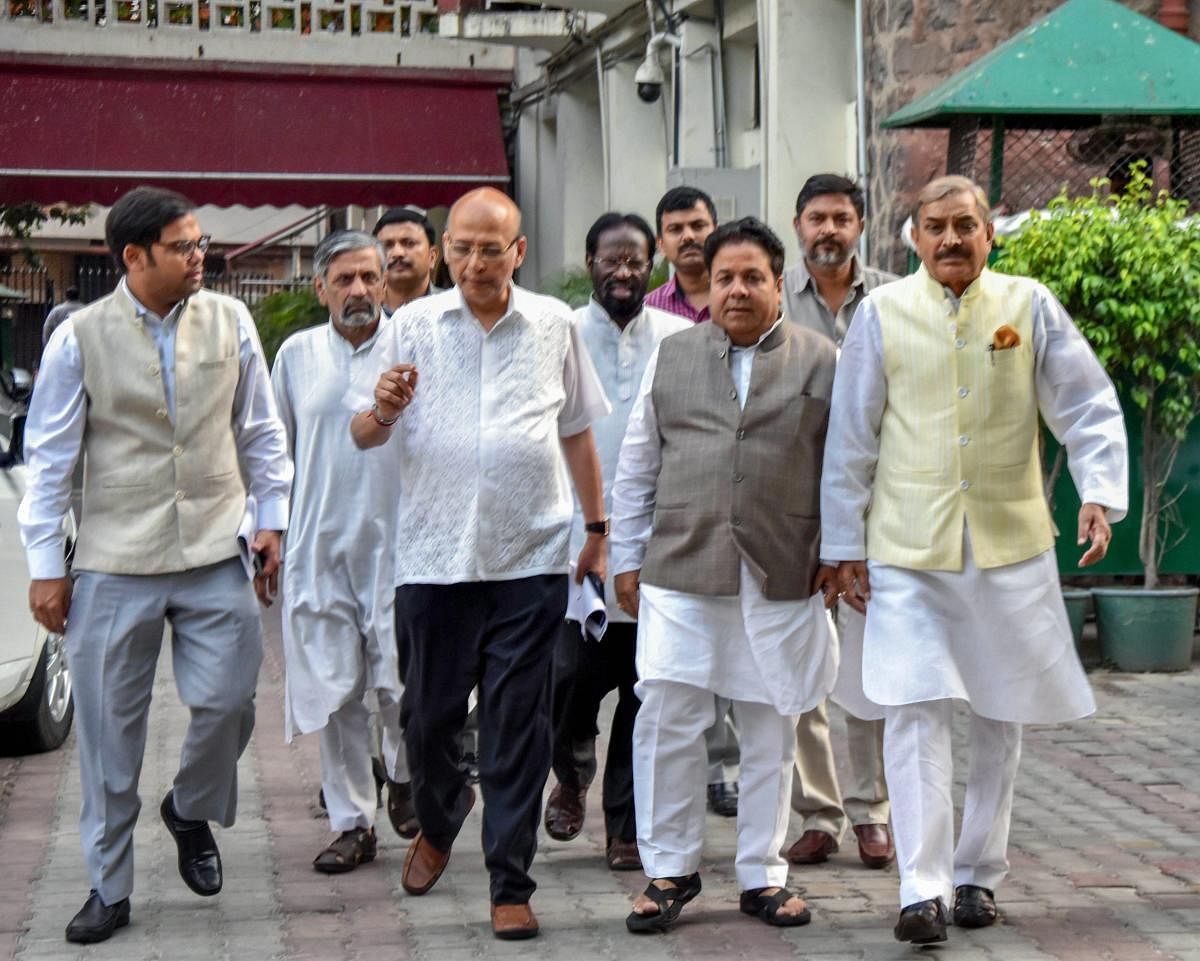 Senior Congress leaders leave after a meeting with Election Commission of India, at Nirvachan Sadan in New Delhi on Thursday. PTI Photo