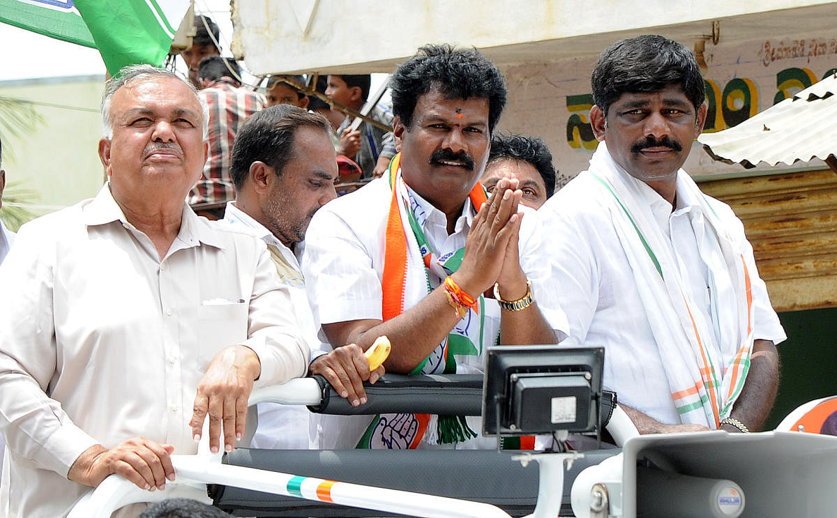 Home minister Ramalinga Reddy and member of parliment D K Suresh campaigning for Anekal assembly constituency congress candidate Shivanna at Anekal on Wednesday. Photo Srikanta Sharma R.