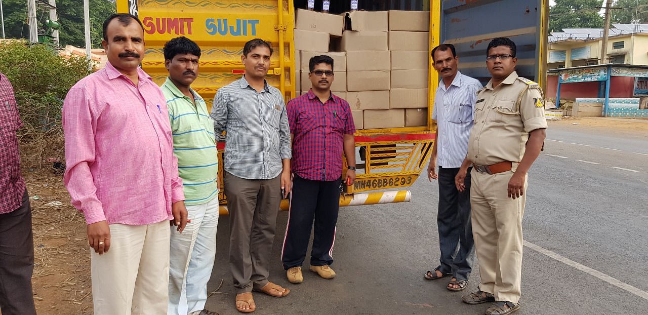 The raided truck containing liquor being transported from Goa.