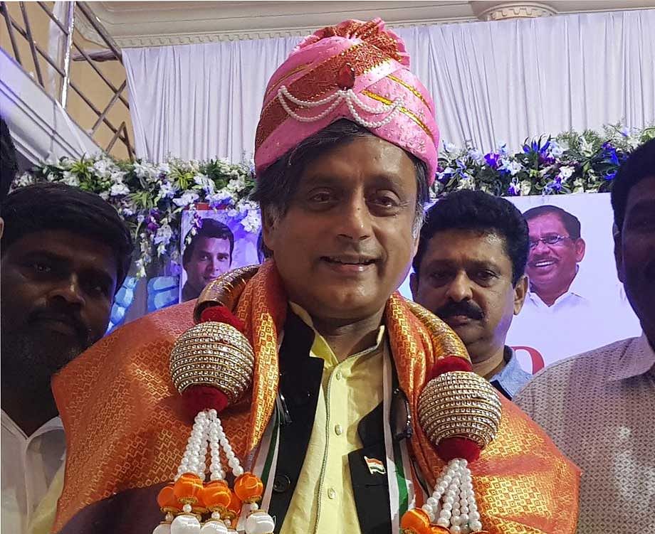 Former chief minister of Kerala Oommen Chandy and Thiruvananthapuram Member of Parliament Shashi Tharoor on Friday campaigned for the CV Raman Nagar Congress candidate R Sampath Raj, also the mayor of the BBMP. Picture courtesy Twitter