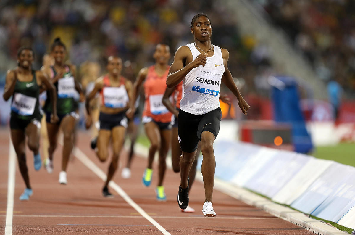 South Africa's Caster Semenya won the women's 1500m gold, breaking her own national record. Reuters