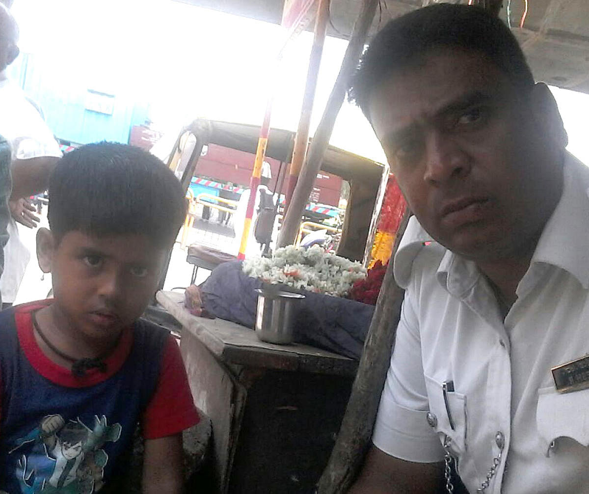Photo of lost and found Chiru (1.5 years) along with Head constable Lokesh R