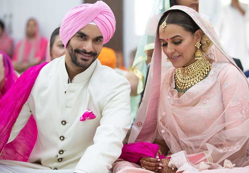 Dhupia shared the news with a picture from the marriage ceremony on her Instagram and Twitter accounts.
