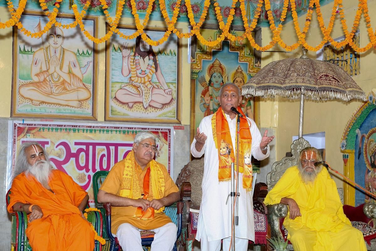 Newly elected Vishwa Hindu Parishad (VHP) chief Vishnu Sadashiv Kokje addresses a meeting of sadhus, in Ayodhya on Monday. PTI Photo