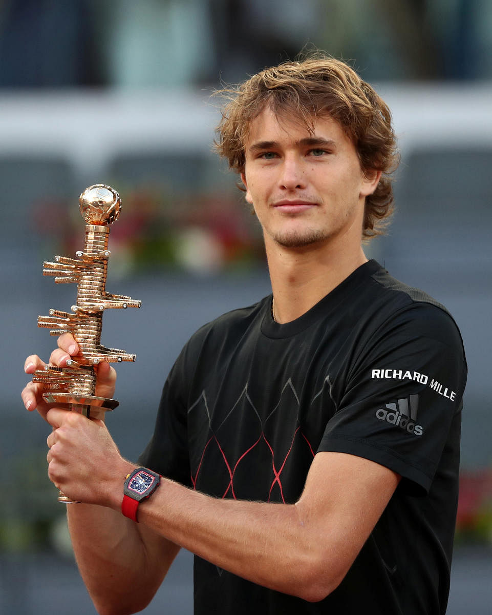 Germany's Alexander Zverev celebrates with the Madrid Open trophy after winning the final against Austria's Dominic Thiem. REUTERS