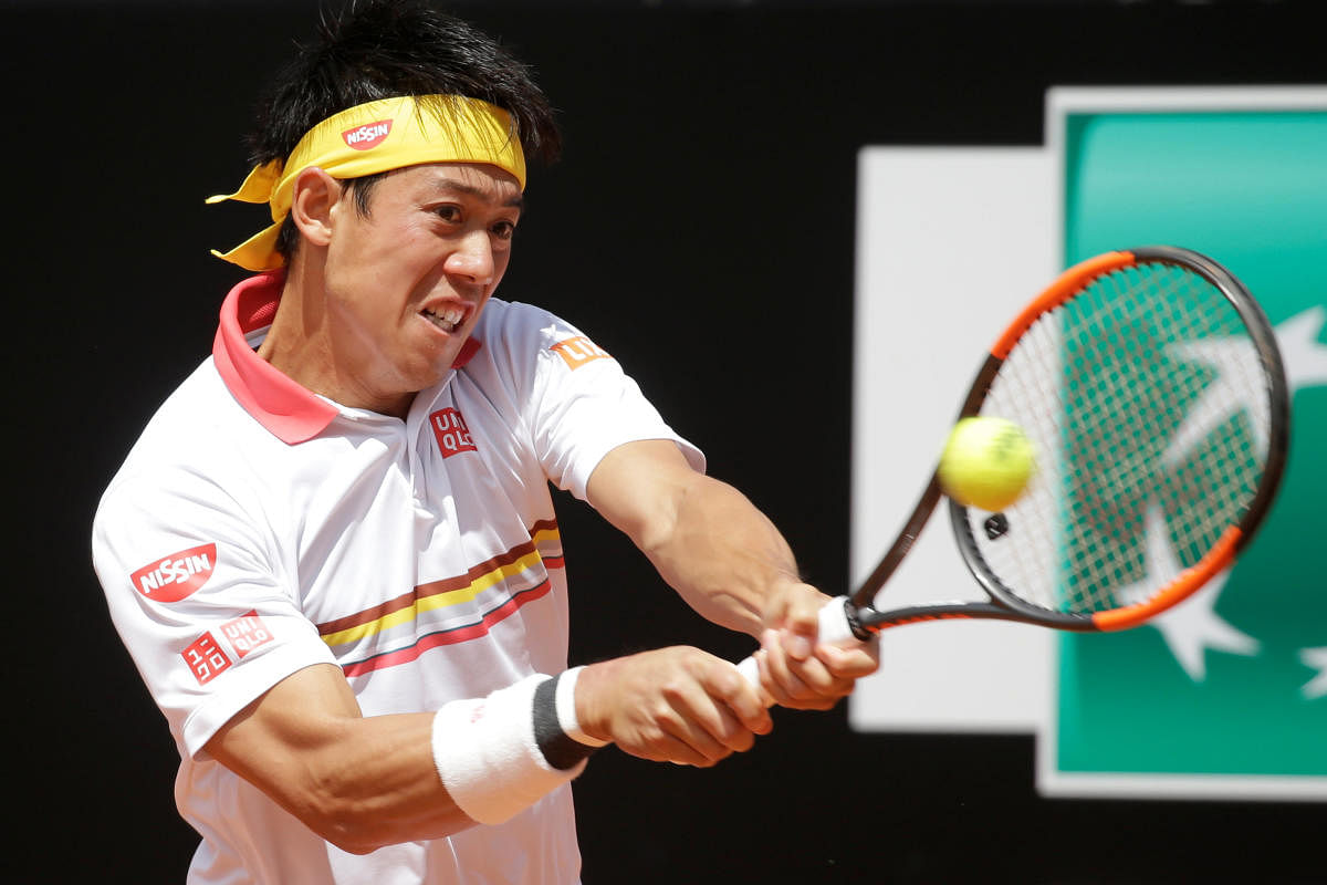 Japan's Kei Nishikori during his first-round win against Spain's Feliciano Lopez. REUTERS