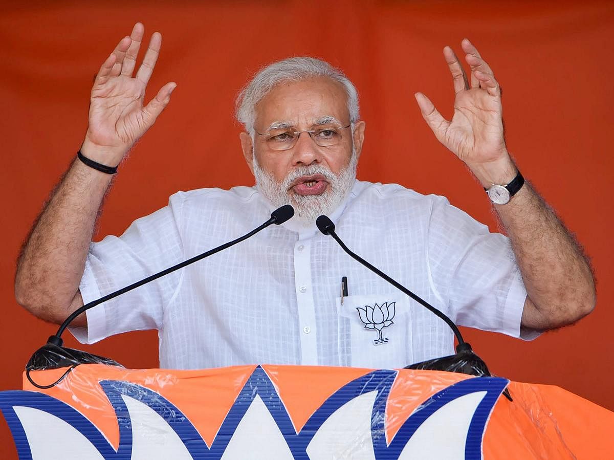 Prime Minister Narendra Modi speaks during an election campaign rally ahead of Karnataka Assembly Elections, at Chikmagalur in Karnataka on Wednesday.