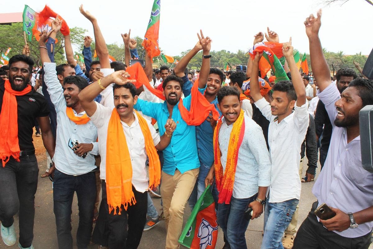 BJP party workers in Udupi celebrating after the results were announced on Tuesday.
