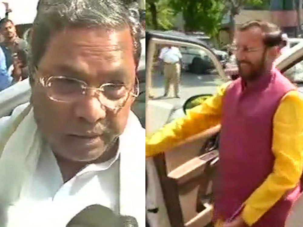 Siddaramaiah and Javadekar arrives at their party offices for deliberations. ANI photos
