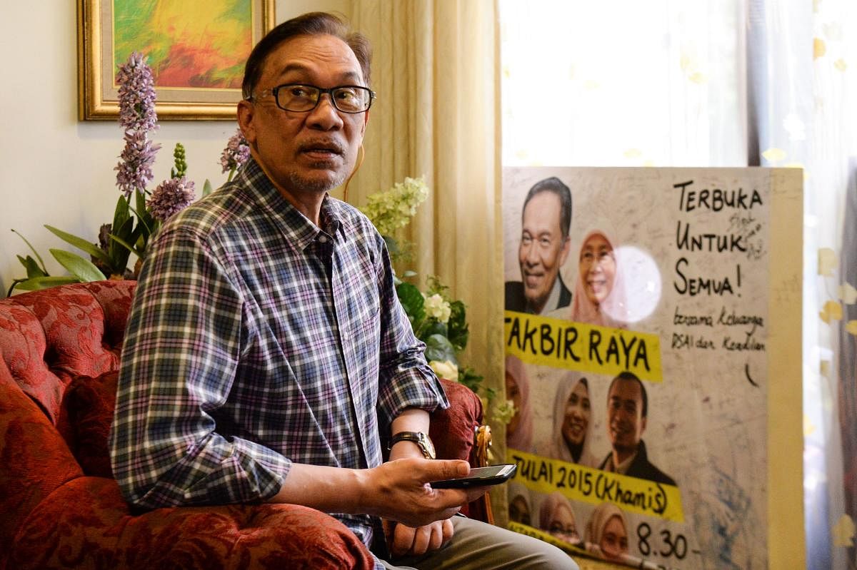 Leader of the Pakatan Harapan coalition, Anwar Ibrahim at his house in Kuala Lumpur on Thursday. AFP
