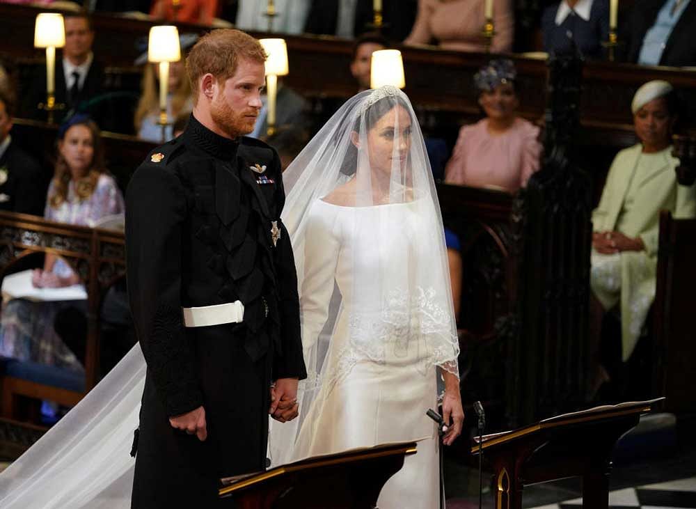 Prince Harry and Meghan Markle in St George's Chapel at Windsor Castle for their wedding in Windsor, Britain. REUTERS Photo