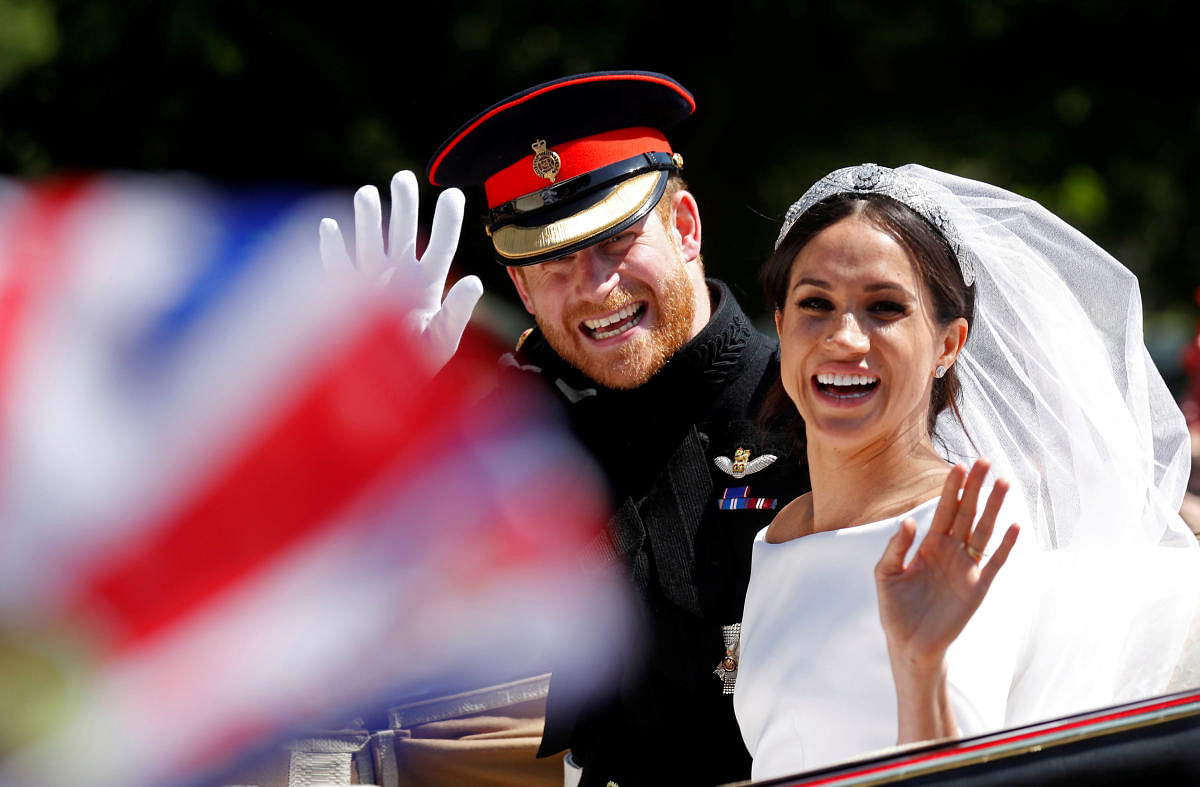 The pictures were all shot at Windsor Castle after Prince Harry and Meghan Markle completed their carriage procession around Windsor city centre as husband and wife. Reuters photo