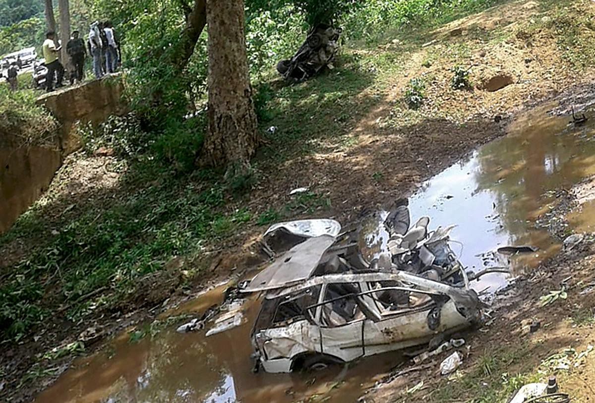Mangled remains of the police vehicle which was blown up by Naxals with an Improvised Explosive Device (IED) in Dantewada district of Chhattisgarh on Sunday. (PTI Photo)