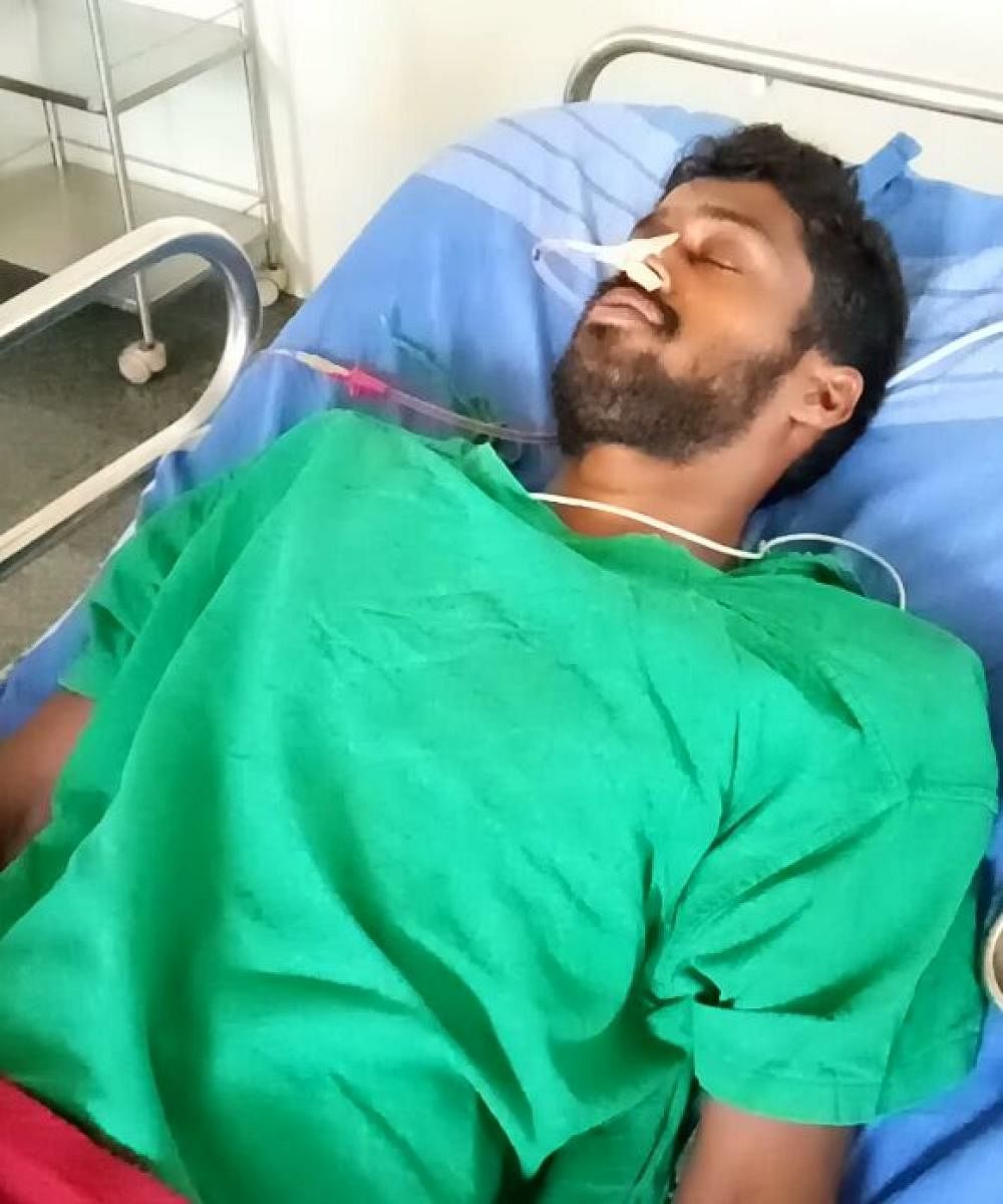BJP and BSY follower Suresh Pujari who attempted suicide on Monday night. DH photo.
