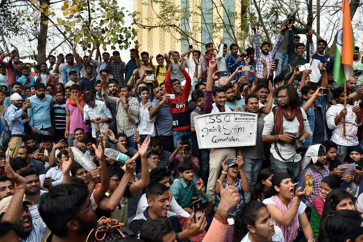 Staff Selection Commission (SSC) aspirants stage a protest over the alleged paper leak of SSC, demanding a CBI investigation, in New Delhi, on Sunday. PTI File Photo