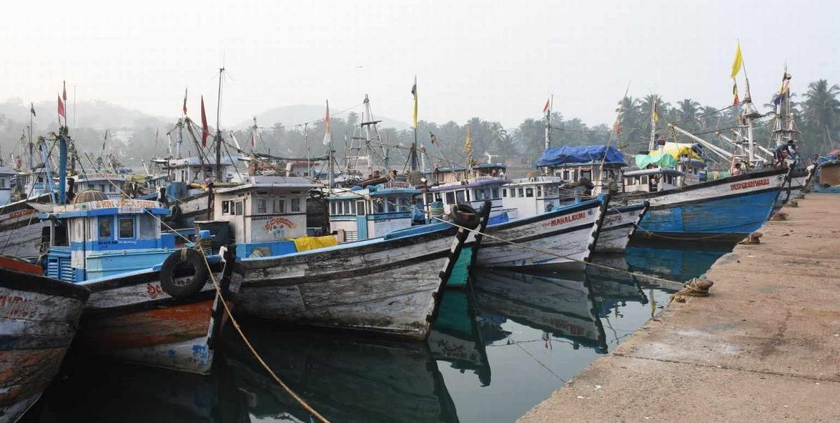A file photo of boats fishing anchored at Baithkola Port, in Karwar. DH Photo