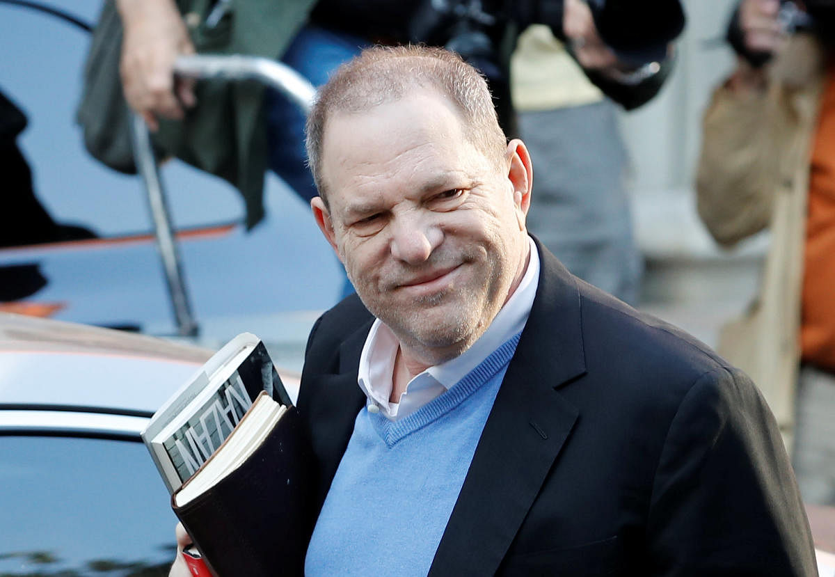 Film producer Harvey Weinstein arrives at the 1st Precinct in Manhattan in New York. Reuters Photo