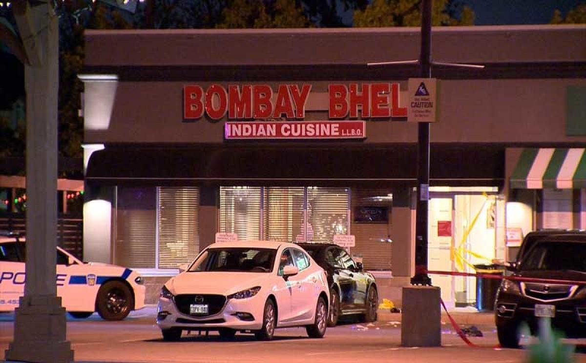 Two suspects with their faces covered entered the Bombay Bhel restaurant late last night, dropped the device and fled, police said. Photo via twitter, courtesy @JeremyGlobalTV.