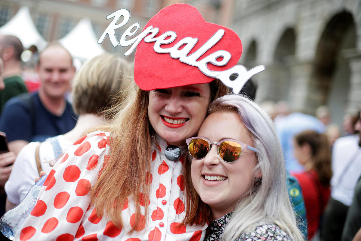 People celebrate the result of yesterday's referendum on liberalizing abortion law, in Dublin, Ireland, May 26, 2018. REUTERS/Max Rossi