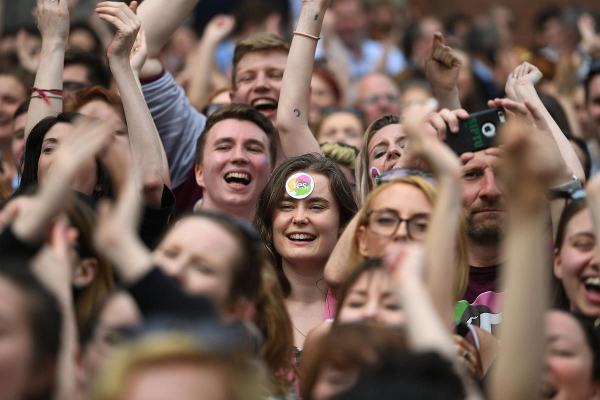 People celebrate the result of yesterday's referendum on liberalizing abortion law, in Dublin, Ireland. REUTERS