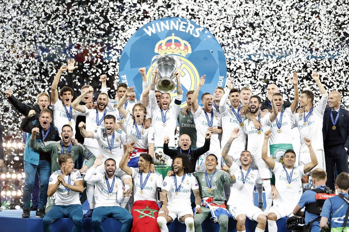  Real Madrid's Sergio Ramos lifts the trophy after winning the Champions League Final soccer match between Real Madrid and Liverpool at the Olimpiyskiy Stadium in Kiev, Ukraine. AP/PTI
