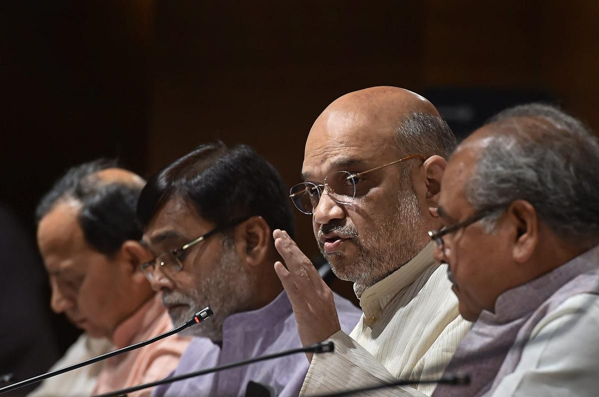 BJP chief Amit Shah along with six cabinet ministers met top functionaries of the RSS to deliberate on government programmes and policies. (PTI file photo)