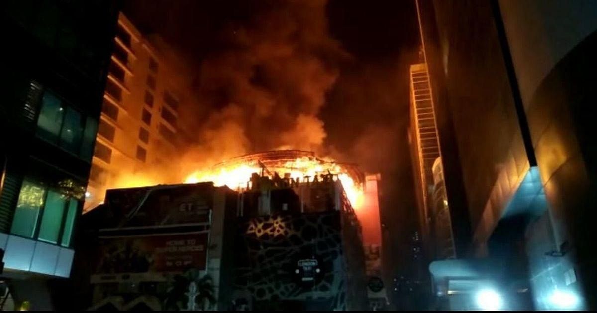 A view of the burning Mojo's Bistro restaurant where 14 people were killed, in Mumbai. PTI file photo