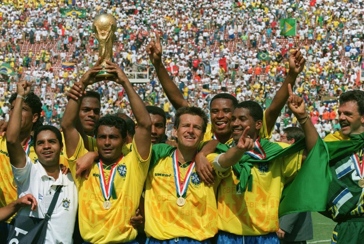 Brazil players with their trophy after triumphing at the 1994 World Cup. 