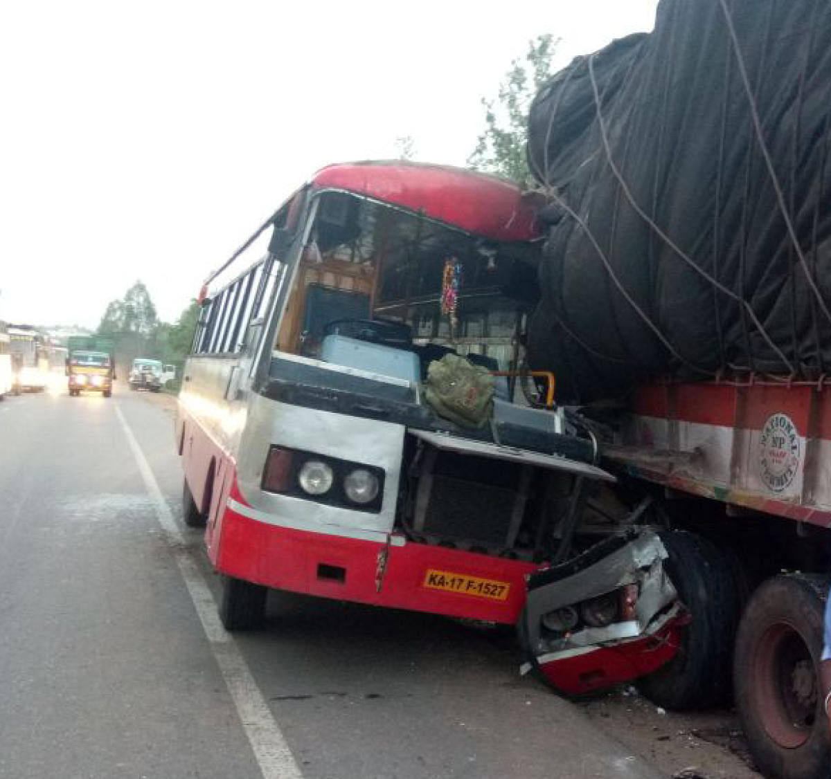 The mangled remains of the KSRTC bus after it ploughed into a parked truck near Nelamangala on Tuesday, killing two people.