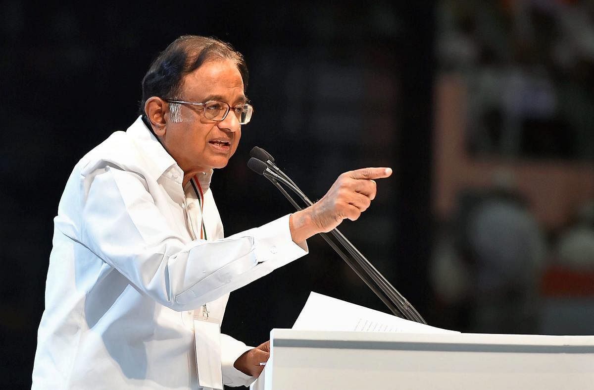 New Delhi: Former Finance Minister P Chidambaram speaks during the second day of the 84th Plenary Session of Indian National Congress (INC), at the Indira Gandhi stadium in New Delhi on Sunday. PTI Photo by Vijay Verma(PTI3_18_2018_000156B)
