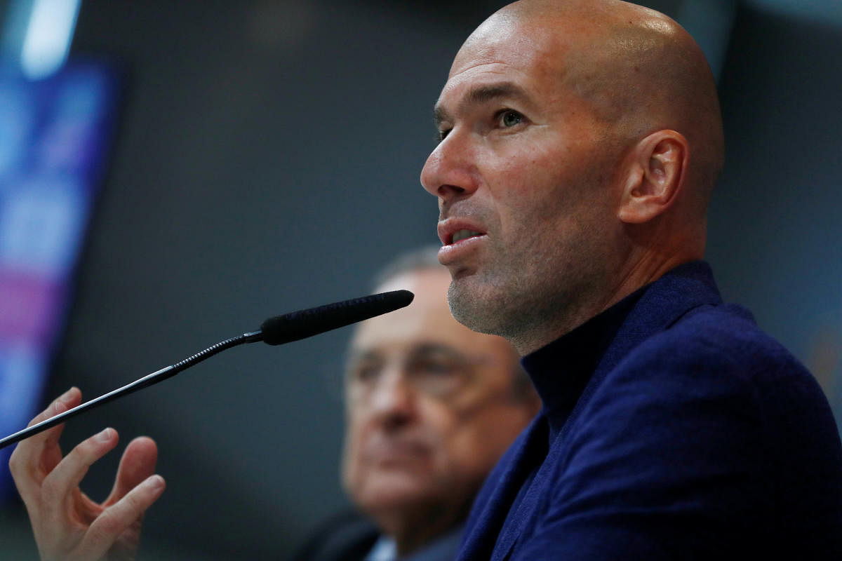 Real Madrid president Florentino Perez and coach Zinedine Zidane during the press conference. REUTERS