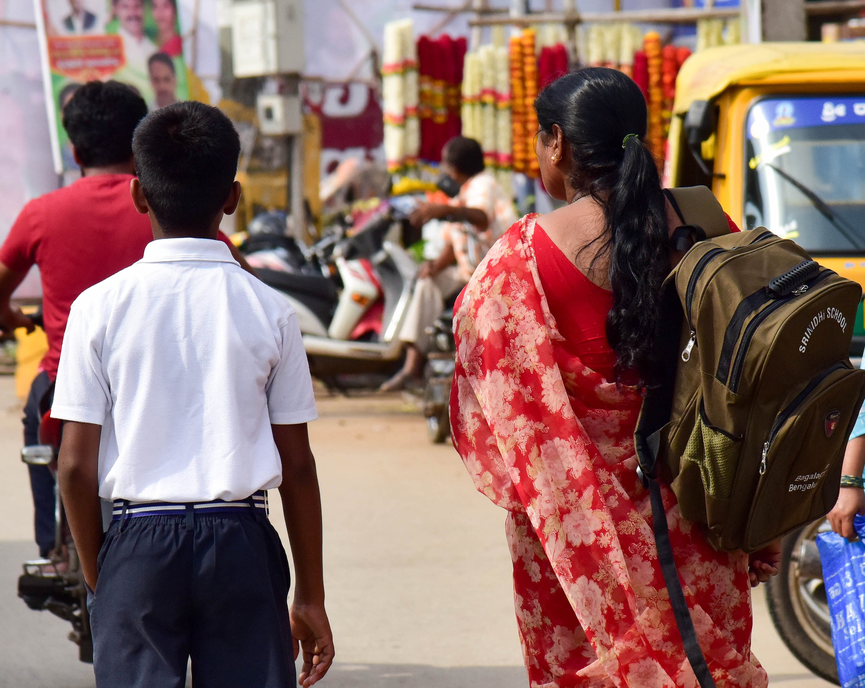 Heavy school bags alter the posture of the child and impact long-term health, doctors say. DH Photo by B H Shivakumar