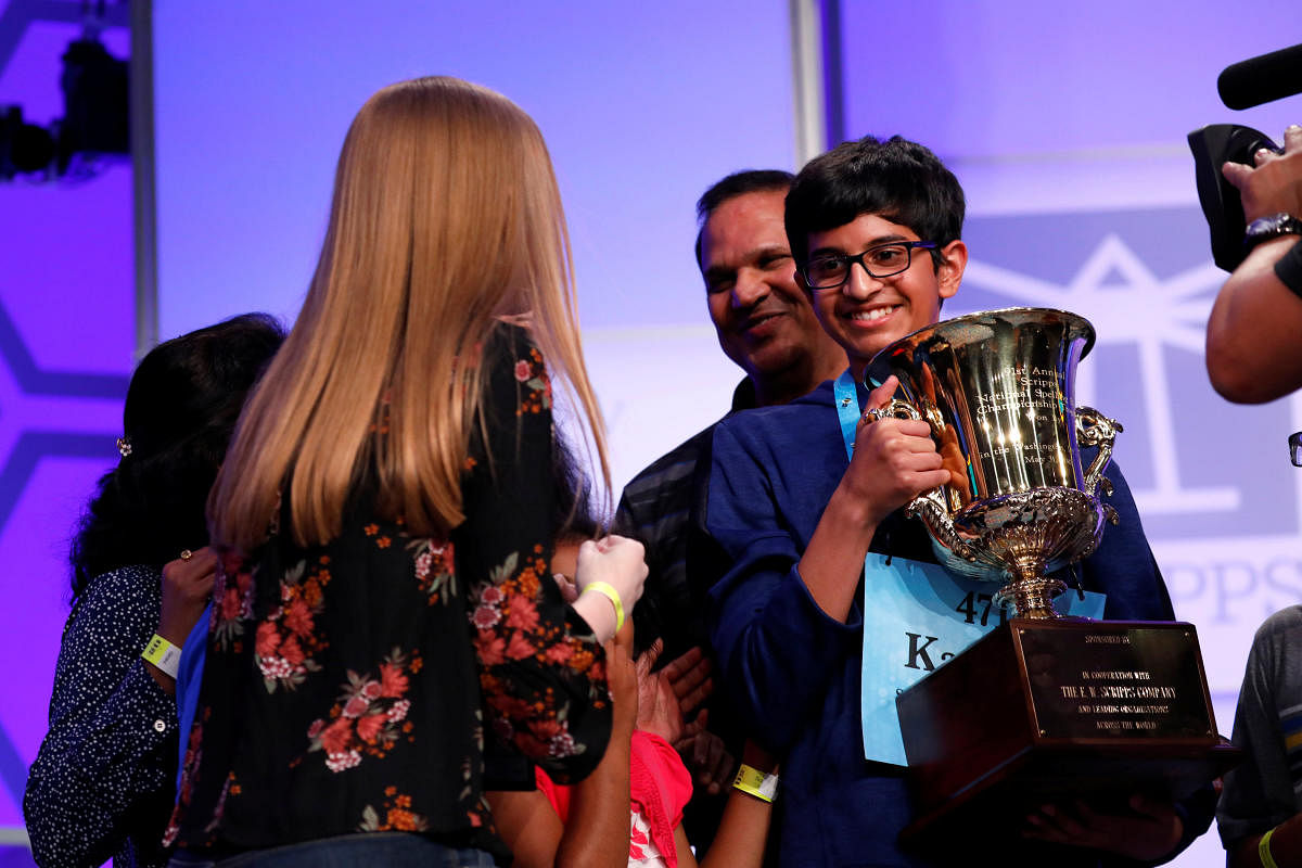 Karthik Nemmani celebrates after winning the Scripps National Spelling Bee at National Harbor in Oxon Hill, Maryland, U.S., May 31, 2018. (REUTERS/Aaron P. Bernstein)