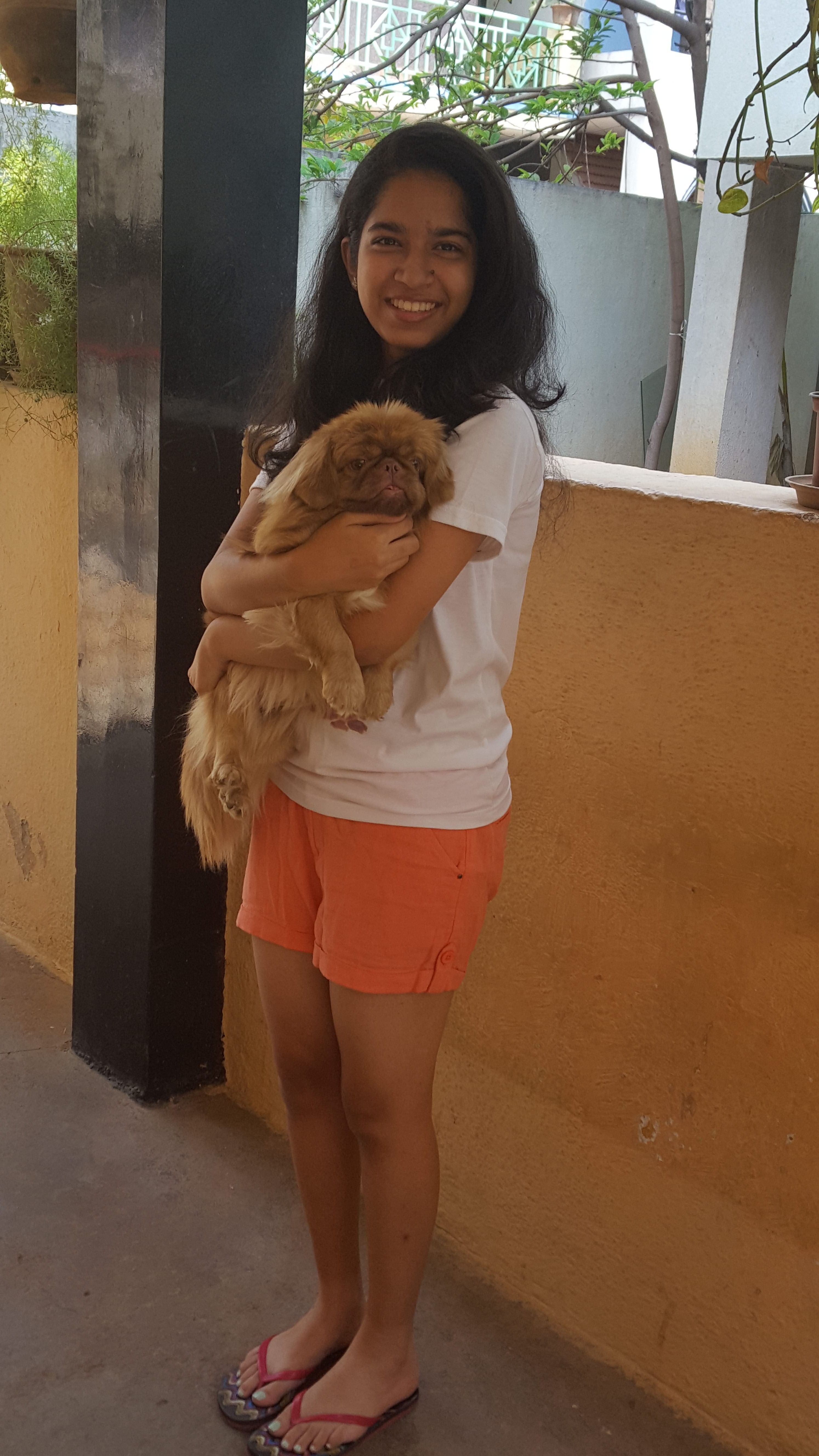 Nidhi with pet Pixie