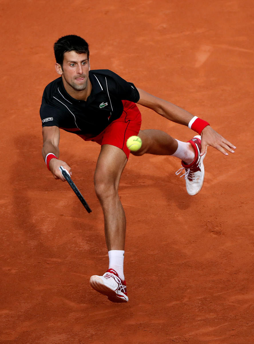 Serbia's Novak Djokovic returns during his fourth-round win over Spain's Fernando Verdasco on Sunday. REUTERS