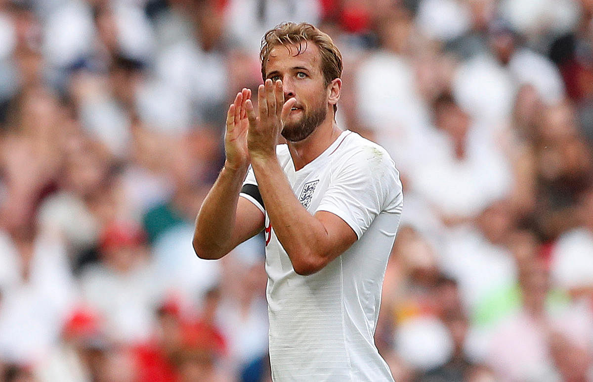 BIG JOB England players have decided to share the work load with skipper Harry Kane. Reuters 