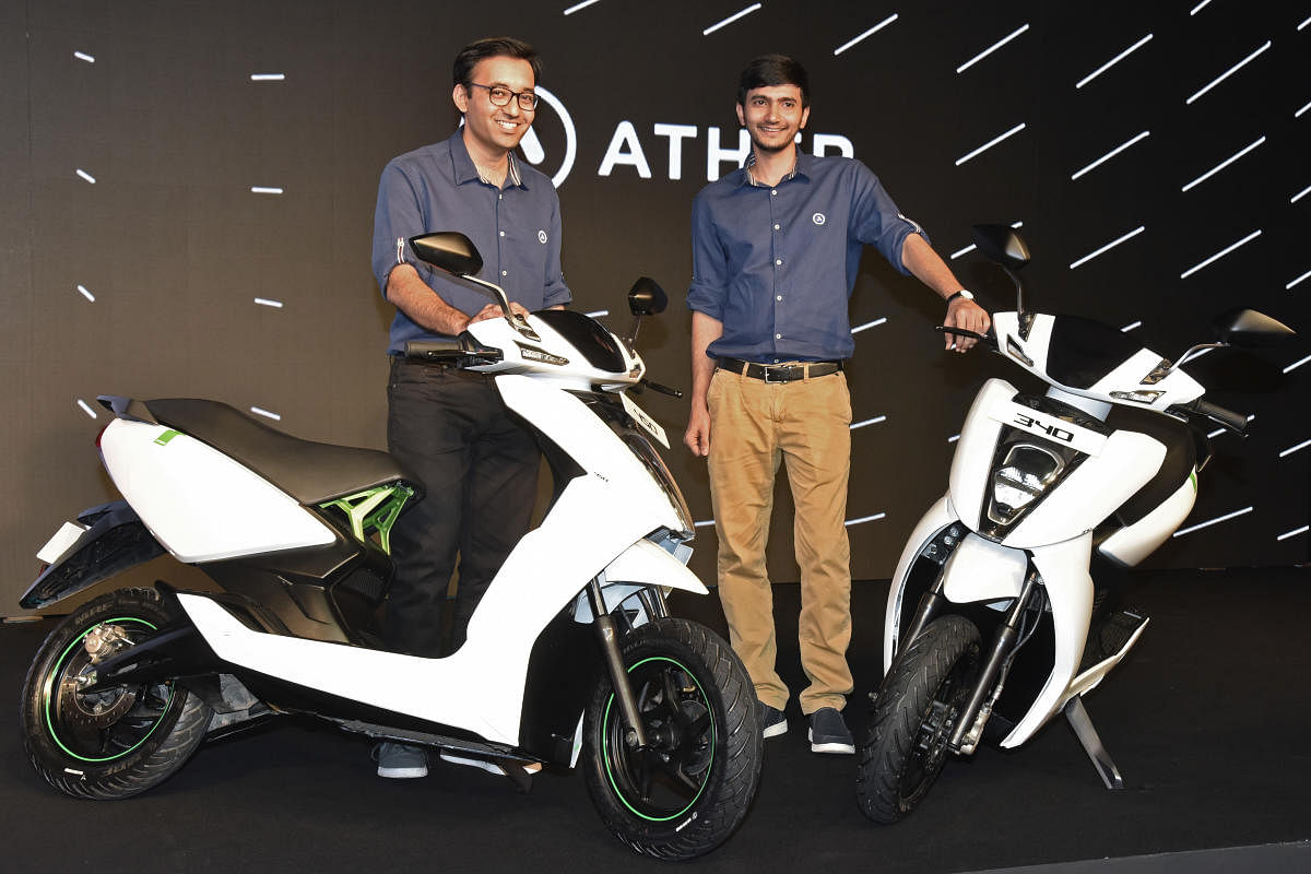Tarun Mehta (left) and Swapnil Jain launch the electric scooters Ather 450 and 340 in Bengaluru on Tuesday. DH Photo