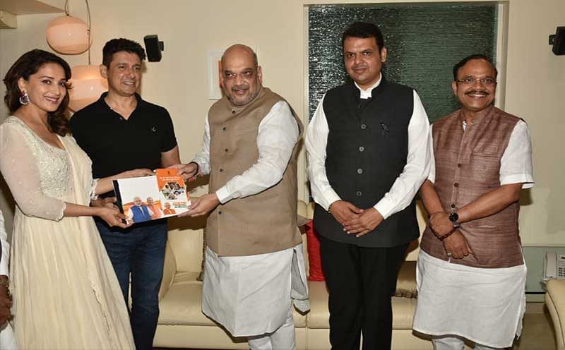 In picture: BJP president Amit Shah, actress Madhuri Dixit and Maharashtra Chief Minister Devendra Fadnavis. 