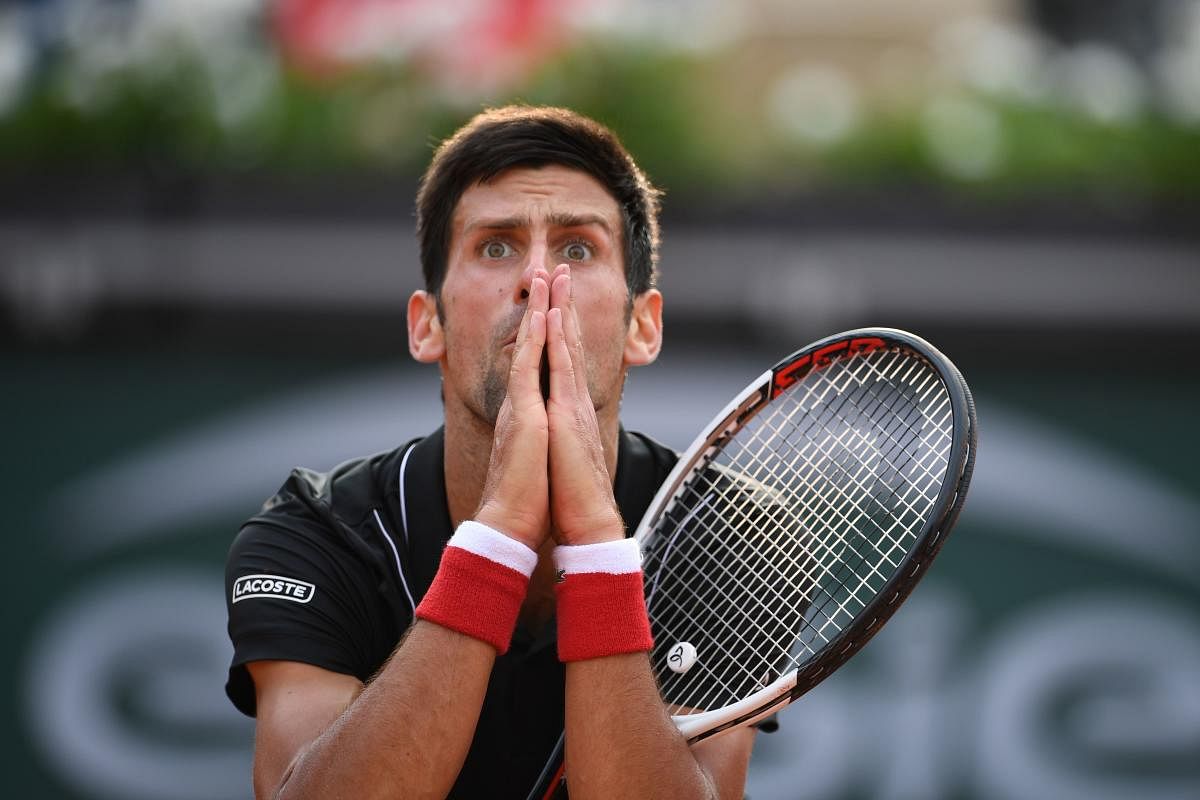 Serbia's Novak Djokovic indifferential form continued as he crashed out of the French Open in the quarterfinal on Tuesday. AFP