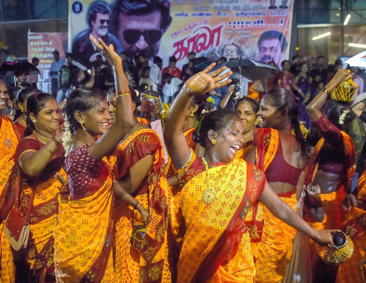 Rajinikanth fans celebrate the release of his film 'Kaala', in Mumbai on Thursday. PTI