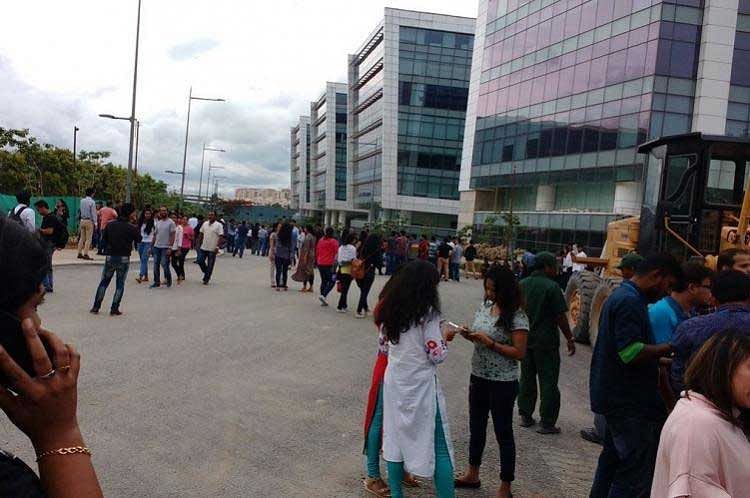 Around 7000 employees were evacuated to a safe assembly point at the Embassy Tech Village’s Cisco office in Kadubeesanahalli following a threat call claiming that a bomb would explode in 10 minutes on Friday afternoon. Image courtesy:  Aadithi Shetty Twitter 